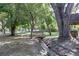 Picturesque creek with a wooden bridge surrounded by lush trees, creating a serene outdoor setting at 3365 Chisholm Trl # B102, Boulder, CO 80301