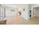 Bright living area features sliding glass door access, updated laundry closet and neutral walls at 3365 Chisholm Trl # B102, Boulder, CO 80301