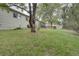 Expansive backyard featuring a lush lawn, mature trees, and a perfect space for outdoor activities and relaxation at 4665 E Peakview Ave, Centennial, CO 80121