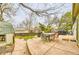 Spacious backyard patio with seating area and a well-maintained yard, great for outdoor entertaining at 4665 E Peakview Ave, Centennial, CO 80121