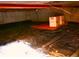 Image of the crawlspace with vapor barrier installed; note some storage in crawlspace area at 4665 E Peakview Ave, Centennial, CO 80121