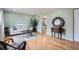 Bright living room with hardwood floors, a comfy sofa, and stylish decor at 4665 E Peakview Ave, Centennial, CO 80121