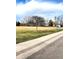 Picturesque park with open green space, walking path and mature trees, ideal for leisure and recreation at 4665 E Peakview Ave, Centennial, CO 80121