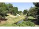 This serene park features a winding path and tranquil stream, perfect for peaceful strolls at 4665 E Peakview Ave, Centennial, CO 80121
