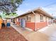 Spacious backyard featuring a patio area, brick accents, and outdoor seating at 3555 Leyden St, Denver, CO 80207