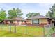 Charming single-story homes with brick exteriors and well-maintained front lawns at 3555 Leyden St, Denver, CO 80207