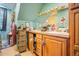 Well-lit bathroom featuring a double sink vanity, spacious mirror, and ample storage at 6100 Bear Paw Rd, Golden, CO 80403