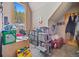 Bright bedroom with large window and ample storage for a cozy and organized living space at 6100 Bear Paw Rd, Golden, CO 80403