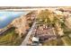 Aerial view of community park with playground and lake at 1469 Hummingbird Cir, Brighton, CO 80601