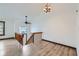 View of the loft and staircase, showing the open floor plan and modern design at 9374 W Friend Dr, Littleton, CO 80128