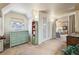 Inviting bedroom with a vintage dresser, decorative walls, and an open doorway to another room at 916 Griffith St, Georgetown, CO 80444