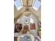 Dining room boasting high ceilings, a ceiling fan, and eye-catching floral wallpaper at 916 Griffith St, Georgetown, CO 80444