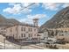 Charming building with a tower, complemented by stunning mountain views in a quaint setting at 916 Griffith St, Georgetown, CO 80444