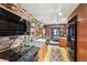 Bright kitchen featuring wooden cabinets and brick accents at 916 Griffith St, Georgetown, CO 80444