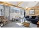 Bright living room with large windows providing ample natural light and mountain views at 916 Griffith St, Georgetown, CO 80444