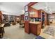 Cozy living room with a brick fireplace and built-in bookshelves at 916 Griffith St, Georgetown, CO 80444