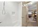 Clean, tiled shower area with a built-in niche and access to the bedroom at 916 Griffith St, Georgetown, CO 80444