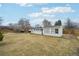 Large, fenced backyard offers plenty of space for outdoor activities and entertaining at 3075 S Emerson Way, Englewood, CO 80113