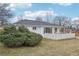 Charming backyard features a well-maintained lawn and patio, perfect for outdoor relaxation and entertaining at 3075 S Emerson Way, Englewood, CO 80113