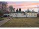Enjoy backyard sunsets and the view of the patio and fenced yard at 3075 S Emerson Way, Englewood, CO 80113