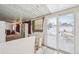 A multi-purpose room that features sliding glass doors, pegboard, drop ceiling, and lots of natural light at 3075 S Emerson Way, Englewood, CO 80113