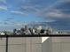 Enjoy breathtaking city views from this rooftop vantage point showcasing the Denver skyline under a cloudy sky at 3256 Federal Blvd, Denver, CO 80211