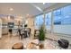 Spacious living area with open kitchen, natural light, and contemporary design at 3256 Federal Blvd, Denver, CO 80211