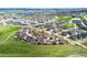 Aerial view showcases the neighborhood's location within a larger community, surrounded by green spaces at 2936 Merry Rest Way, Castle Rock, CO 80109