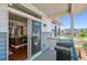 Second-floor balcony featuring a gas grill and views of a well-maintained lawn, just off the kitchen at 2936 Merry Rest Way, Castle Rock, CO 80109
