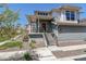 Charming two-story home with a covered front porch and tidy, low-maintenance landscaping at 2936 Merry Rest Way, Castle Rock, CO 80109