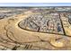Expansive aerial view of a Primary-planned community highlighting homes, landscaping, and community planning at 7903 E 50Th Dr, Denver, CO 80238