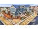 A solar-paneled home with a fenced yard and nearby street access at 7903 E 50Th Dr, Denver, CO 80238