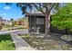 Property includes a tree swing and concrete walking path with a grey gravel detail, creating a welcoming outdoor space at 970 S Steele St, Denver, CO 80209