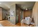 Living room with dark walls, hardwood flooring, and cozy seating area at 970 S Steele St, Denver, CO 80209