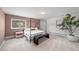 A modern bedroom showcases a stylish four-poster bed and sleek decor at 970 S Steele St, Denver, CO 80209