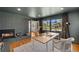 Charming office with a cozy fireplace, a large window, and hardwood floors at 970 S Steele St, Denver, CO 80209