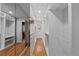 Bright, spacious walk-in closet with custom shelving and hardwood floors, offering ample storage space at 970 S Steele St, Denver, CO 80209