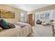 Bright bedroom with neutral colors and a large window at 861 N Humboldt St # A, Denver, CO 80218