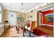 Bright dining room with classic table and access to multiple rooms at 861 N Humboldt St # A, Denver, CO 80218