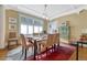 Dining room with a table and seating for six, plus a vintage display cabinet at 861 N Humboldt St # A, Denver, CO 80218