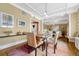 Spacious dining area with hardwood floors, room to seat six, and stylish decor at 861 N Humboldt St # A, Denver, CO 80218