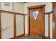 Inviting foyer featuring decorative door, paneled walls, and tiled floor, creating an atmosphere of refined elegance at 861 N Humboldt St # A, Denver, CO 80218