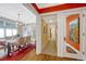 Warm and inviting hallway connecting the dining room, with beautiful trim work and flooring at 861 N Humboldt St # A, Denver, CO 80218