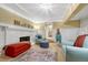 Cozy living area has a white-painted fireplace with hearth and mantel, and decorative trim at 861 N Humboldt St # A, Denver, CO 80218