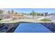 Spacious backyard with stone border and view of open space at 7243 S Millbrook Ct # F, Aurora, CO 80016
