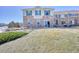 Spacious backyard featuring a well maintained lawn and stone and siding exterior at 7243 S Millbrook Ct # F, Aurora, CO 80016