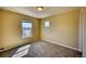 Bedroom featuring carpet, natural light, and a neutral color palette at 7243 S Millbrook Ct # F, Aurora, CO 80016