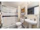 Contemporary bathroom featuring a walk-in shower, pedestal sink, and stylish fixtures at 2 Twin Flower, Littleton, CO 80127