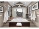 Luxurious bathroom with a soaking tub, mountain view, and natural light at 2 Twin Flower, Littleton, CO 80127