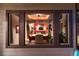 Exterior view of dining room showing table setting and wood ceiling at 2 Twin Flower, Littleton, CO 80127